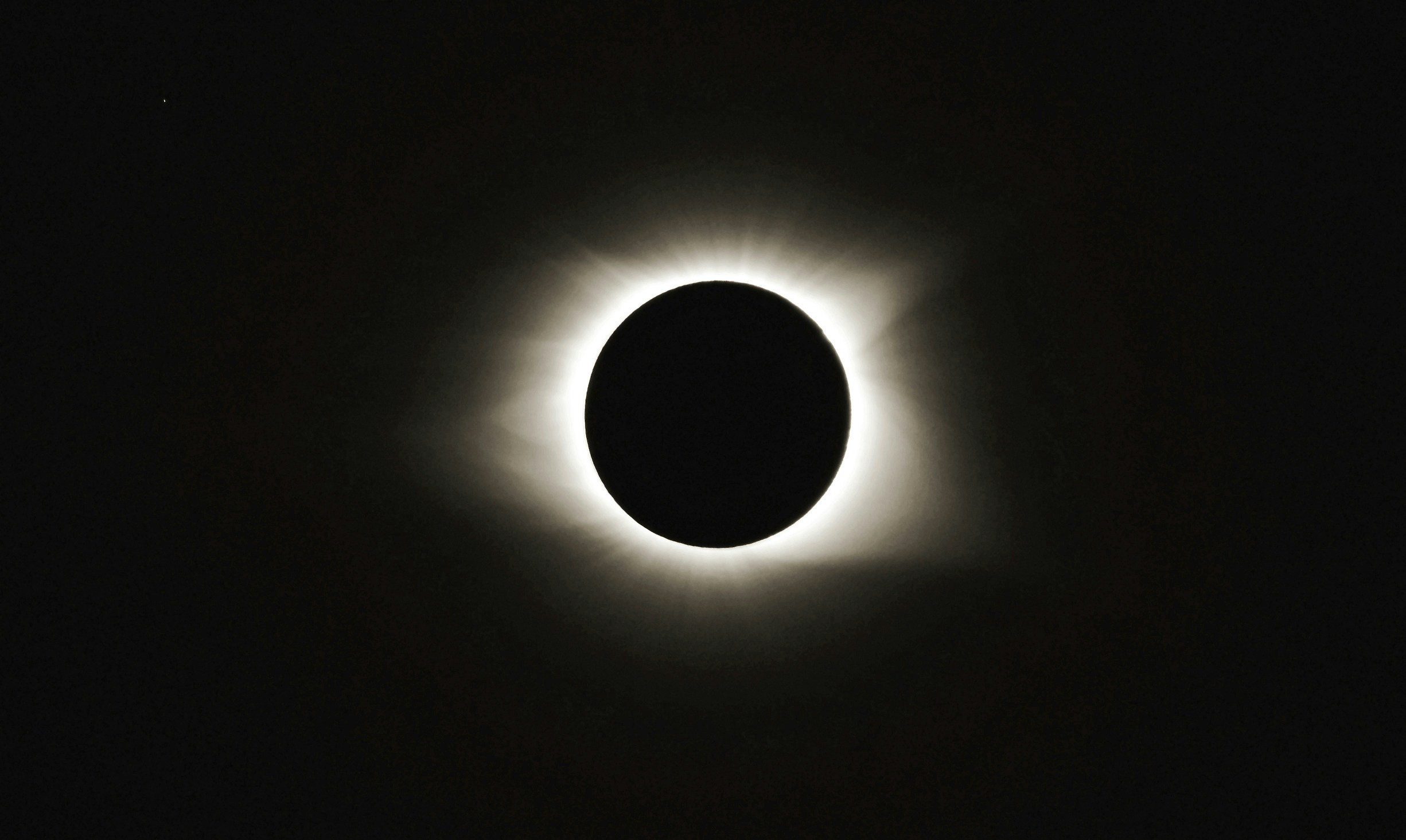 This was the first solar eclipse I had ever seen and it was made more special by a family gathering … three generations watching together! Also note the visible star in the upper left corner, appearing as the sun maintained totality.