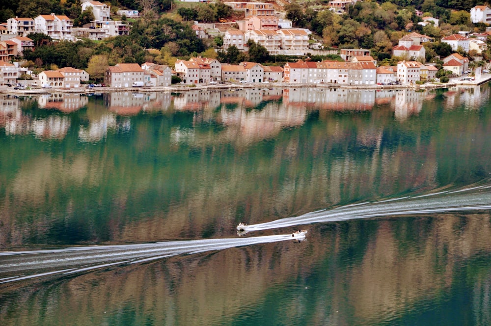 village near body of water