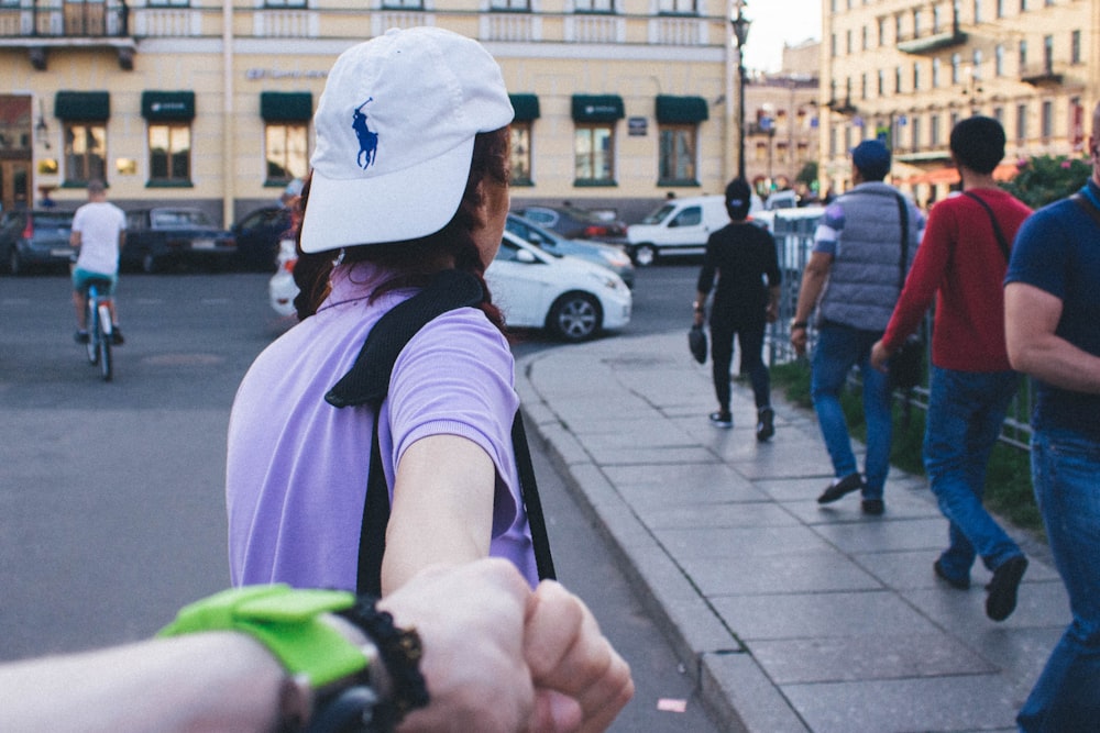 person holding another person's hand