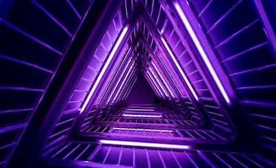 recursive purple and black pyramid-shaped passage with white lighting 