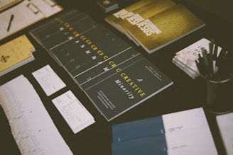 pen and books on table