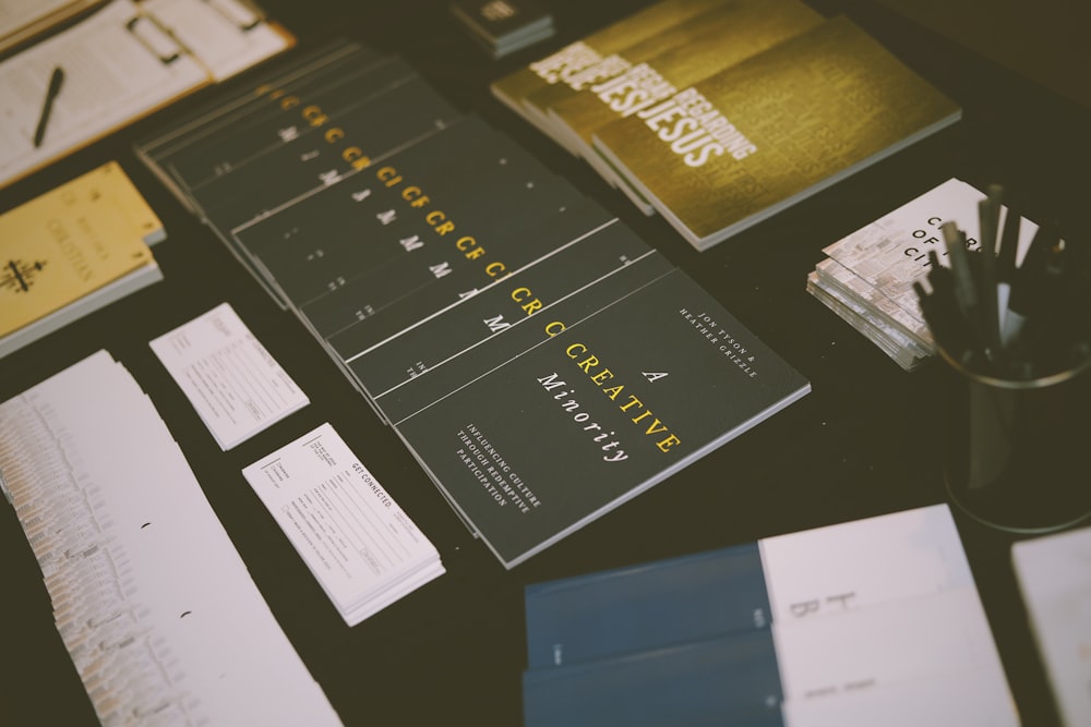 pen and books on table