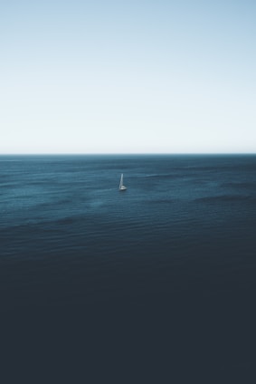 sailboat on body of water during daytime