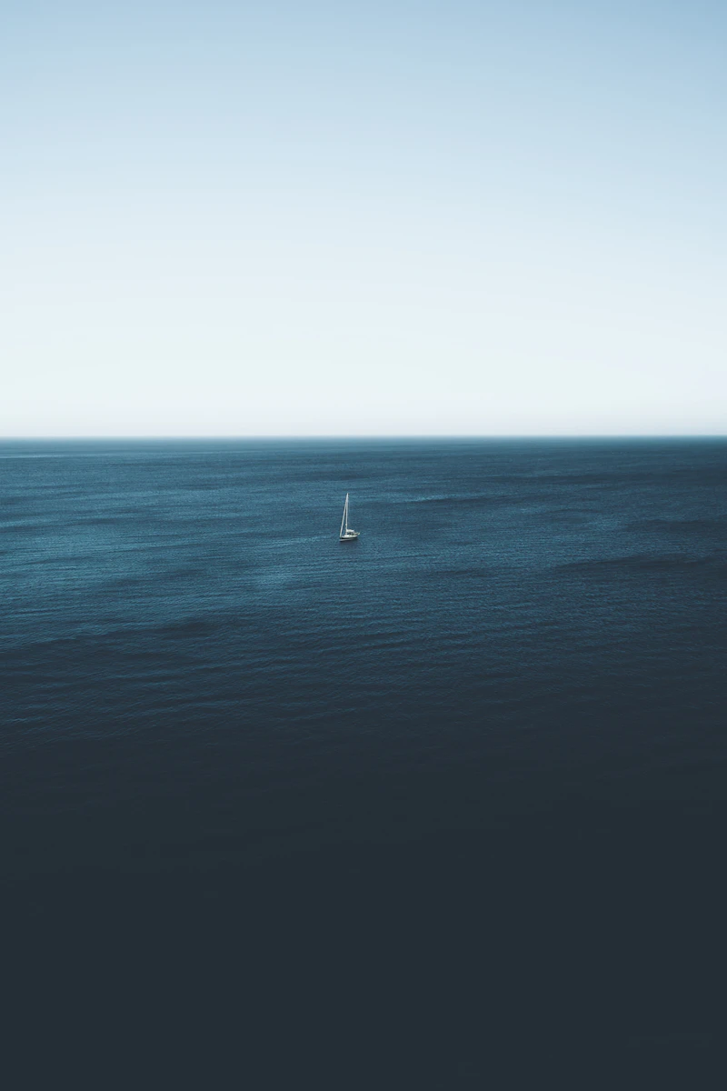 Man standing alone, looking out, in quiet reflection