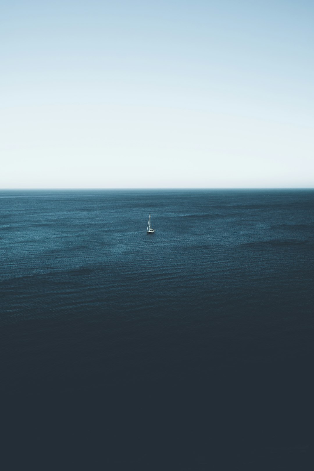 sailboat on body of water during daytime