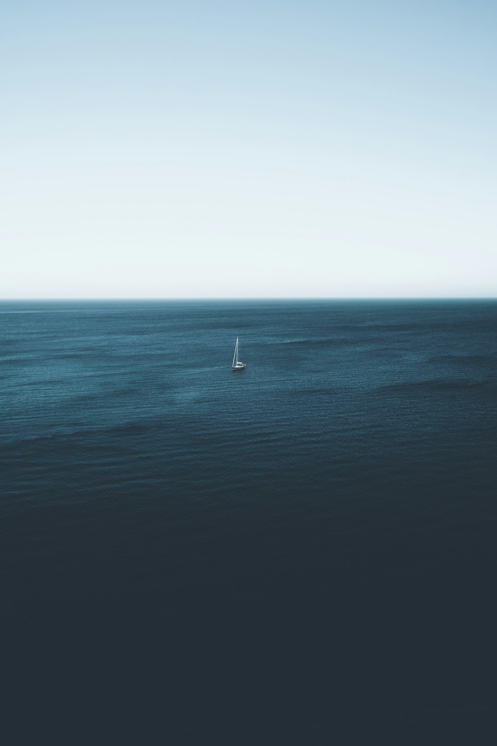 sailboat on body of water during daytime