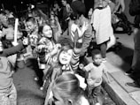 A lively event scene filled with joyful interactions and emotions.