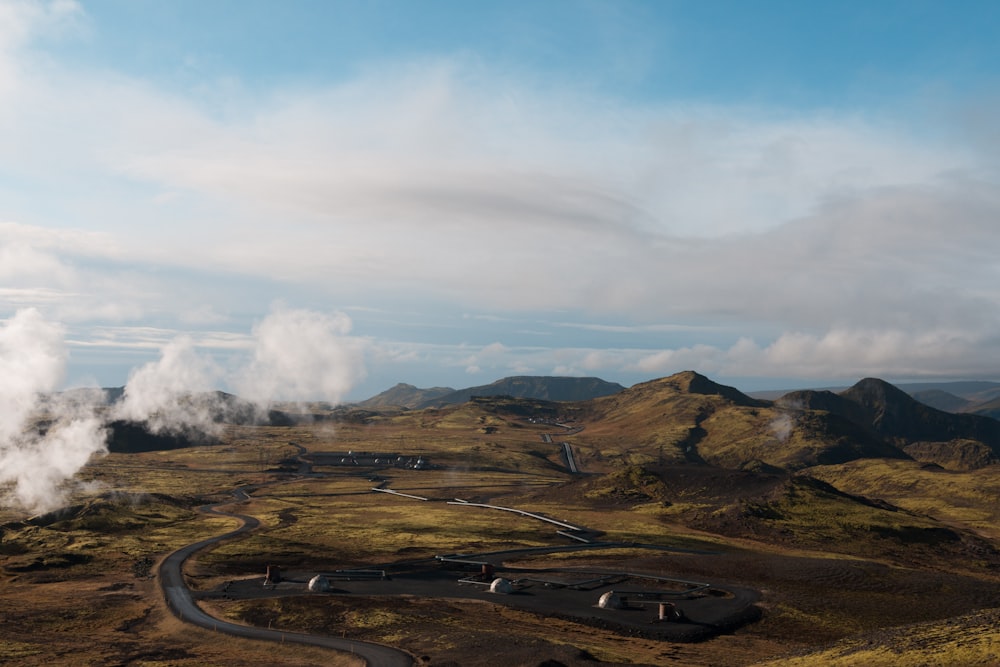 winding road near mountain and volcano