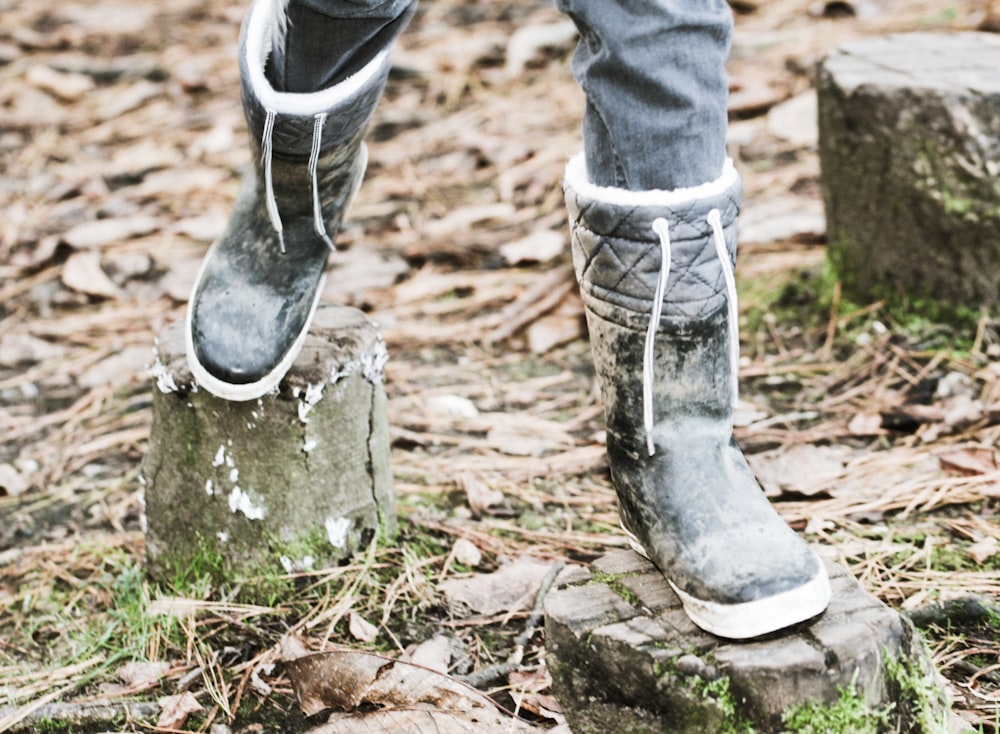 person walking on tree slab