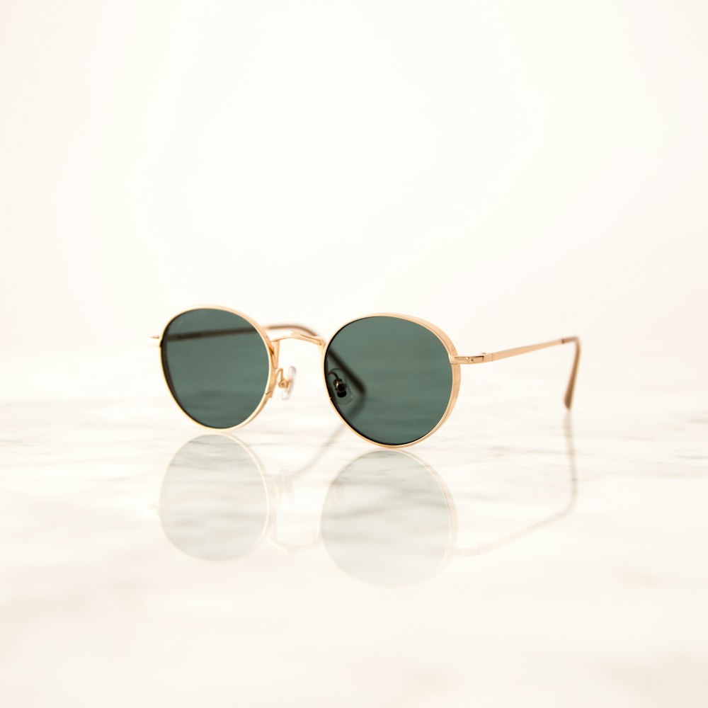 gold framed aviator style sunglasses