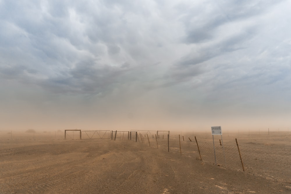 desert with wire fence