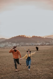 man holdind woman hand