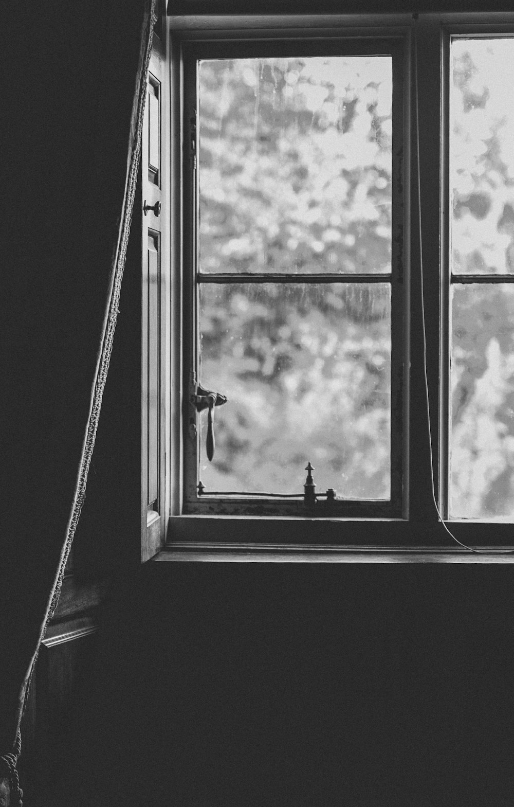 grayscale photo of window