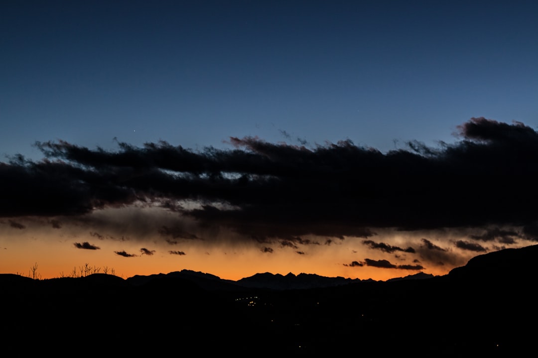silhouette of mountain during dusk