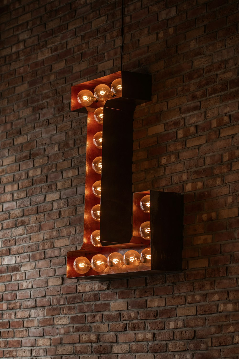 L light signage on wall