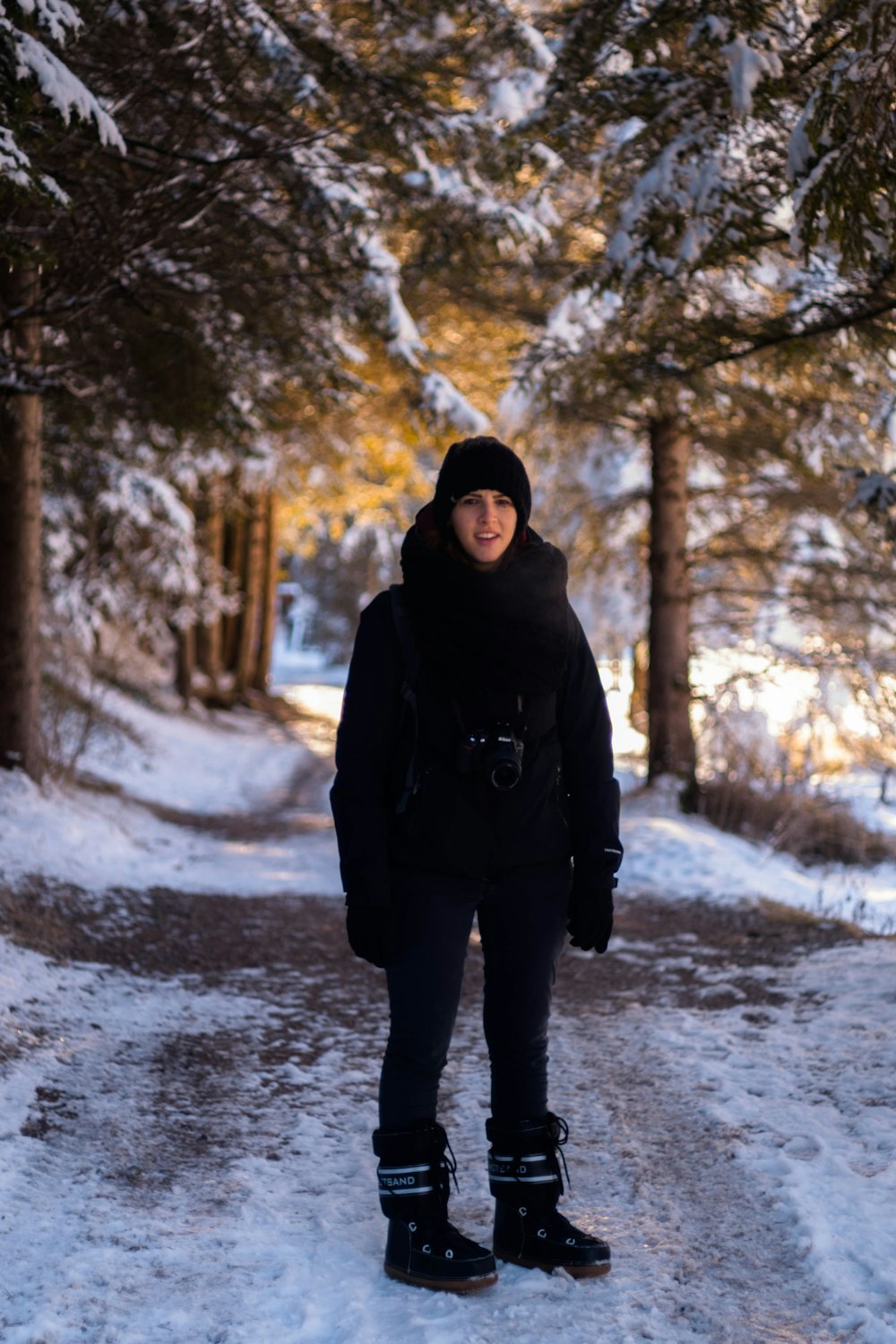 person wearing jacket in pathway