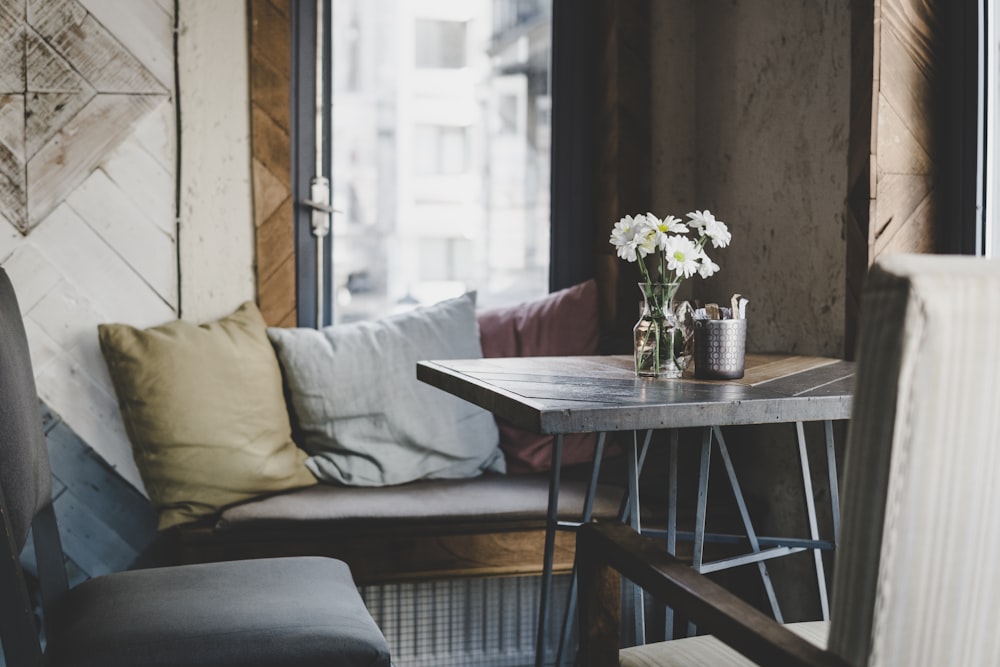 black wooden table near sofa