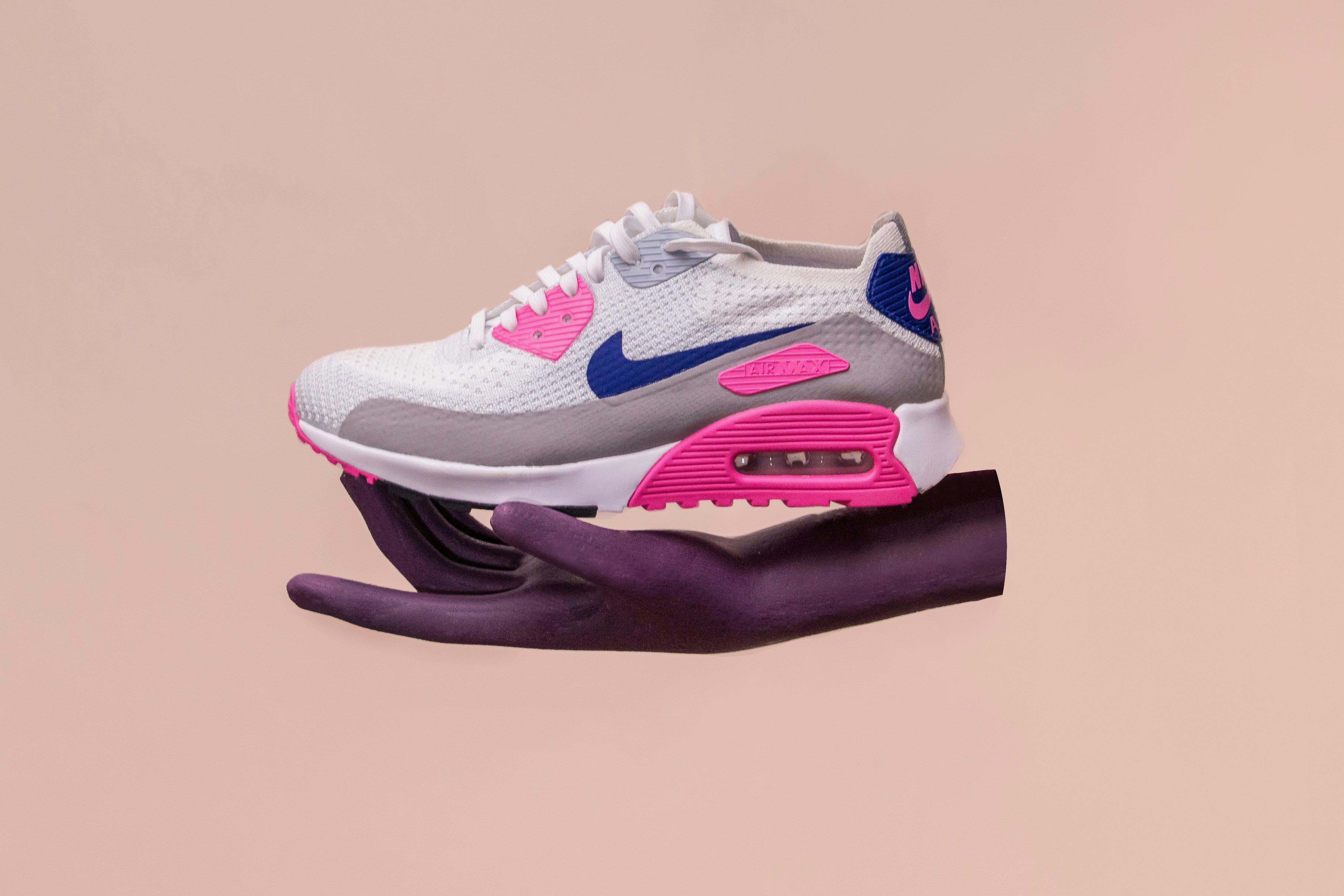 pink blue white nike shoes