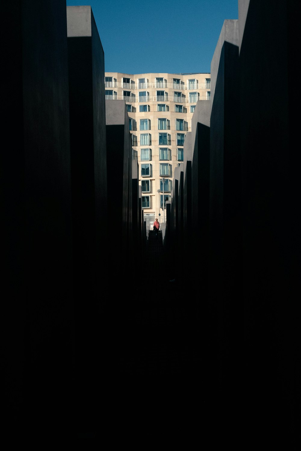 a view of a very tall building from the ground