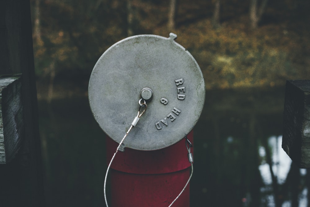 closeup photo of round gray container