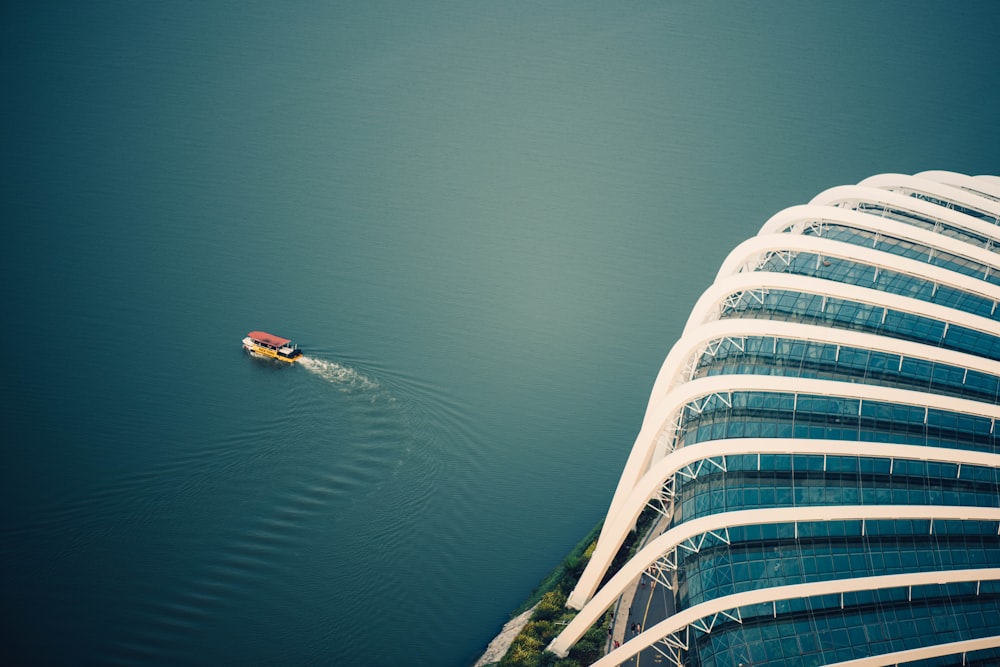 aerial photography of boat on body of water