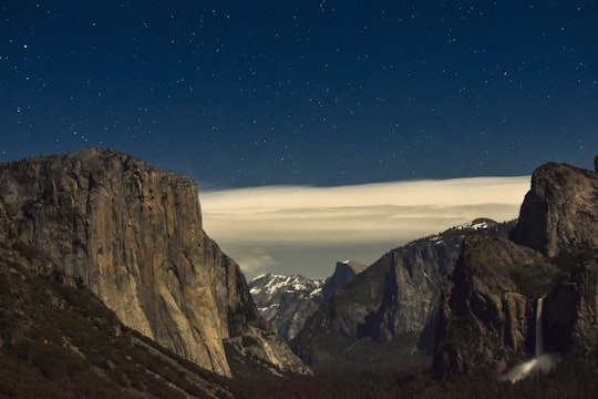 mountain ranges under cloudy sky in Tunnel View United States