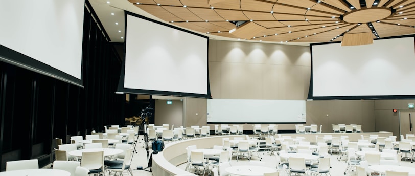 photo of empty room with projector screen