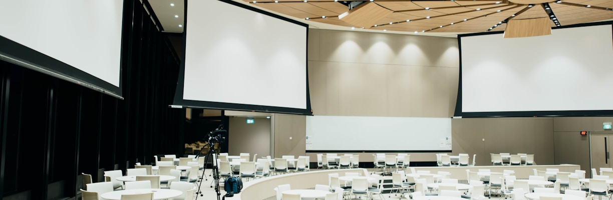 photo of empty room with projector screen