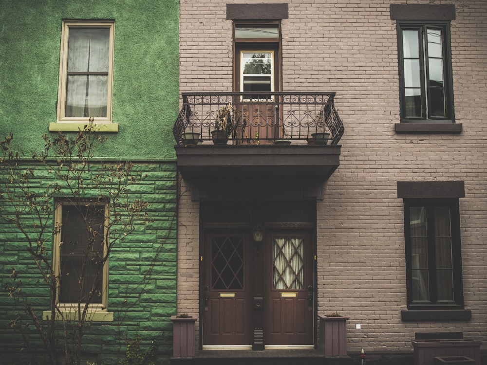 brown and green concrete buildings