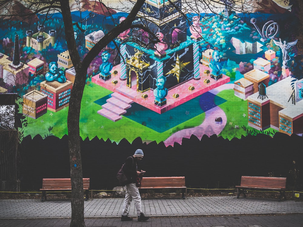 man walking along the sidewalk