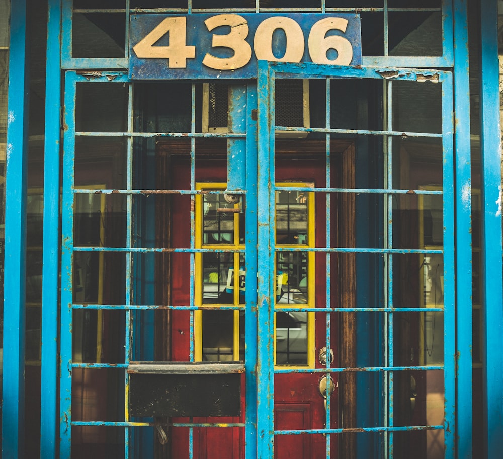 a blue door with a number on it
