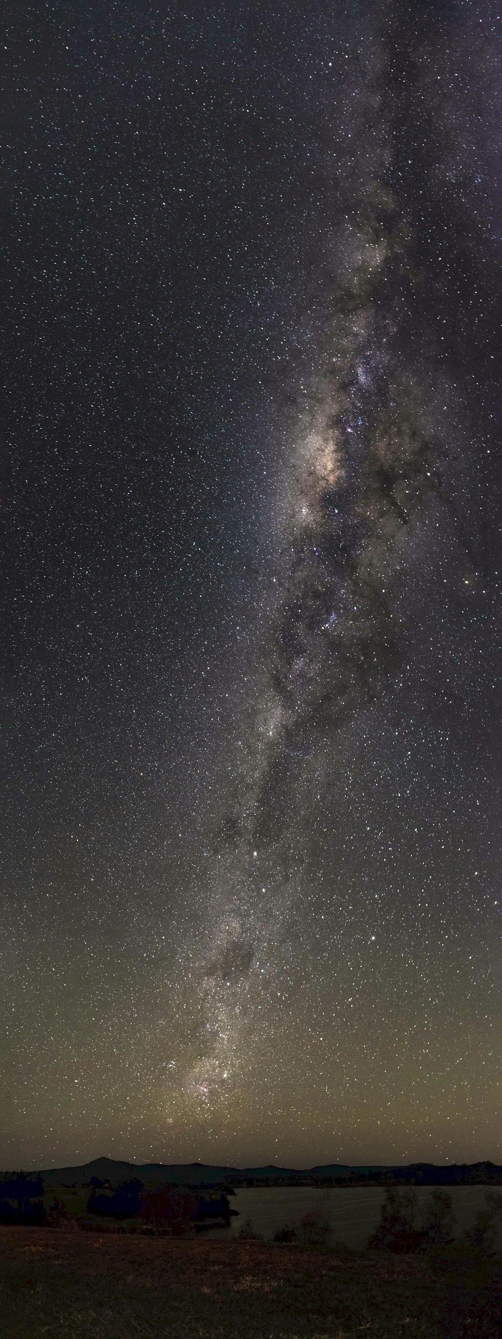 body of water under starry night