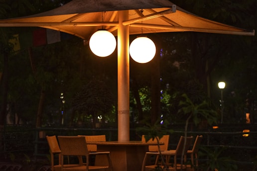 A cozy outdoor setting illuminated by soft lighting.