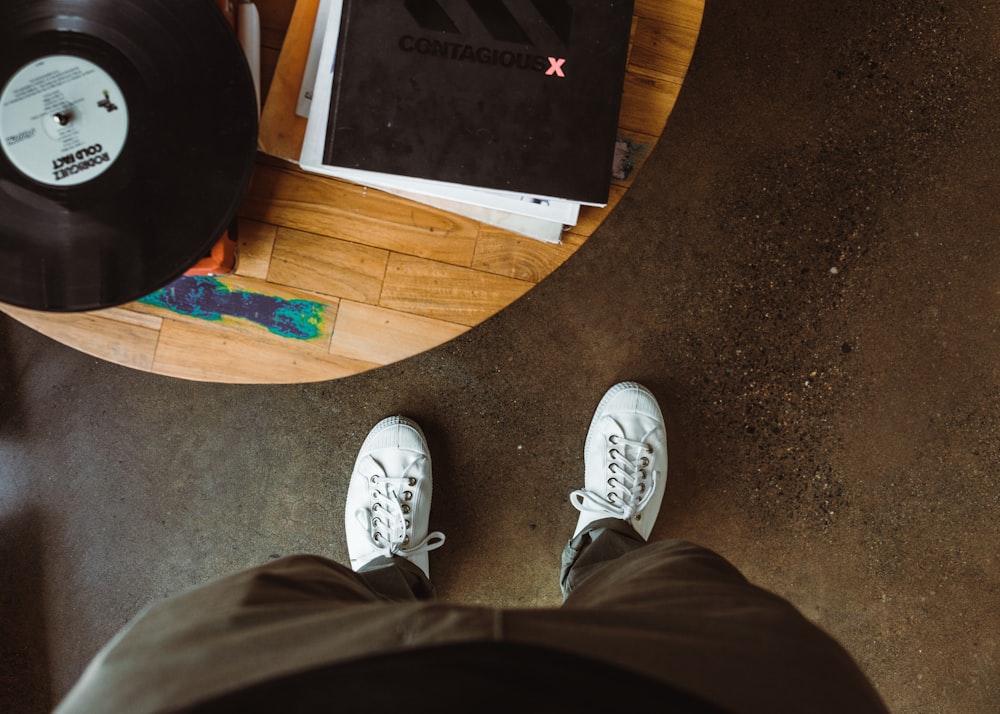 person standing in front of table