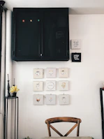 Local artists' work displayed on the warm wooden walls of the coffee shop.