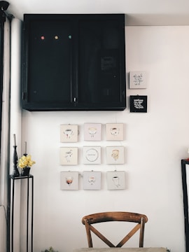 Colorful paintings adorning the coffee shop walls.