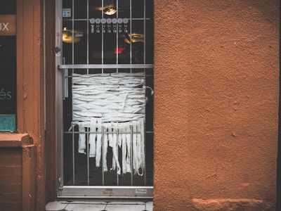 A stylish metal curtain installation in a storefront.