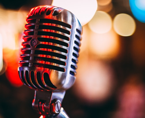 bokeh photography of condenser microphone