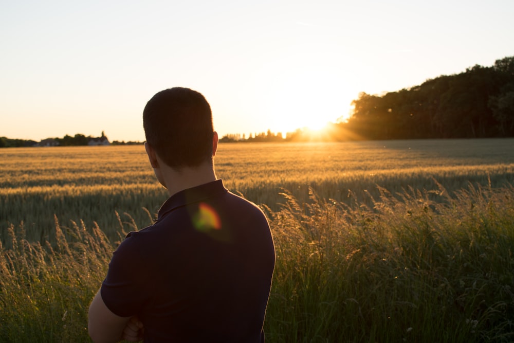 man looking at the sunset