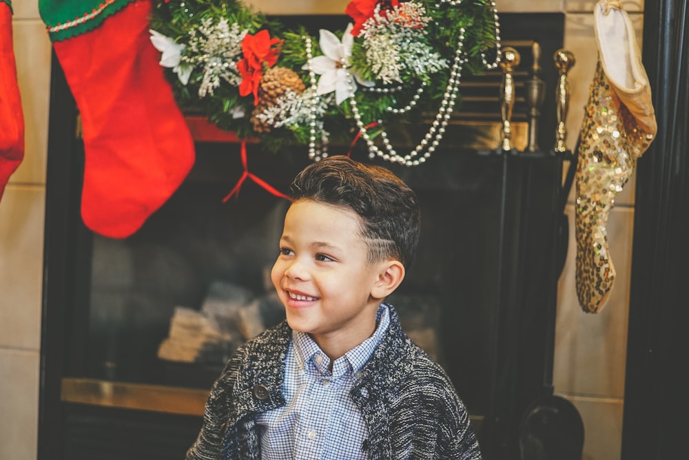 boy wearing gray collared top