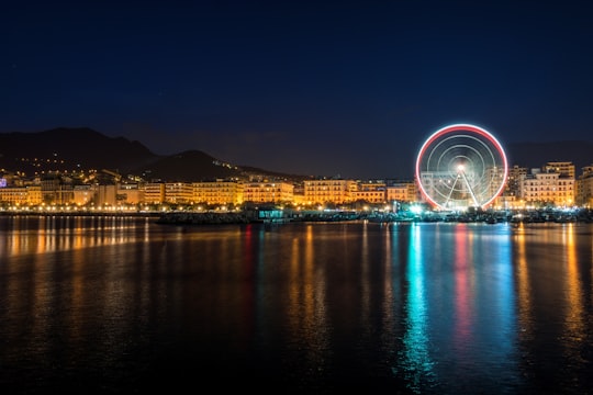 time-lapse photography of London Eye during night time in Salerno Italy