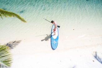 man surfing on beach