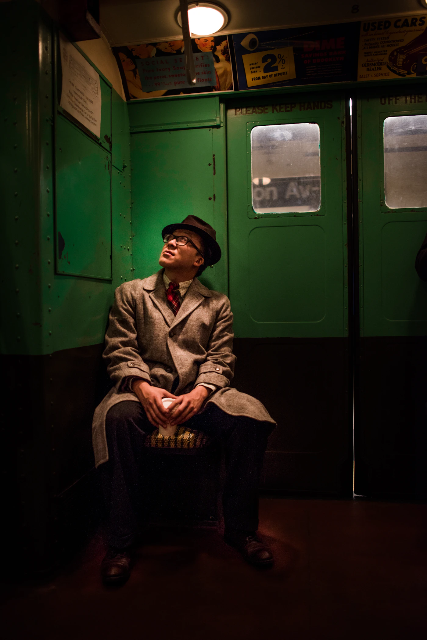 Person alone on a subway train