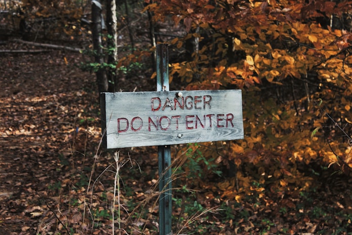 photo of gray danger do not enter signage