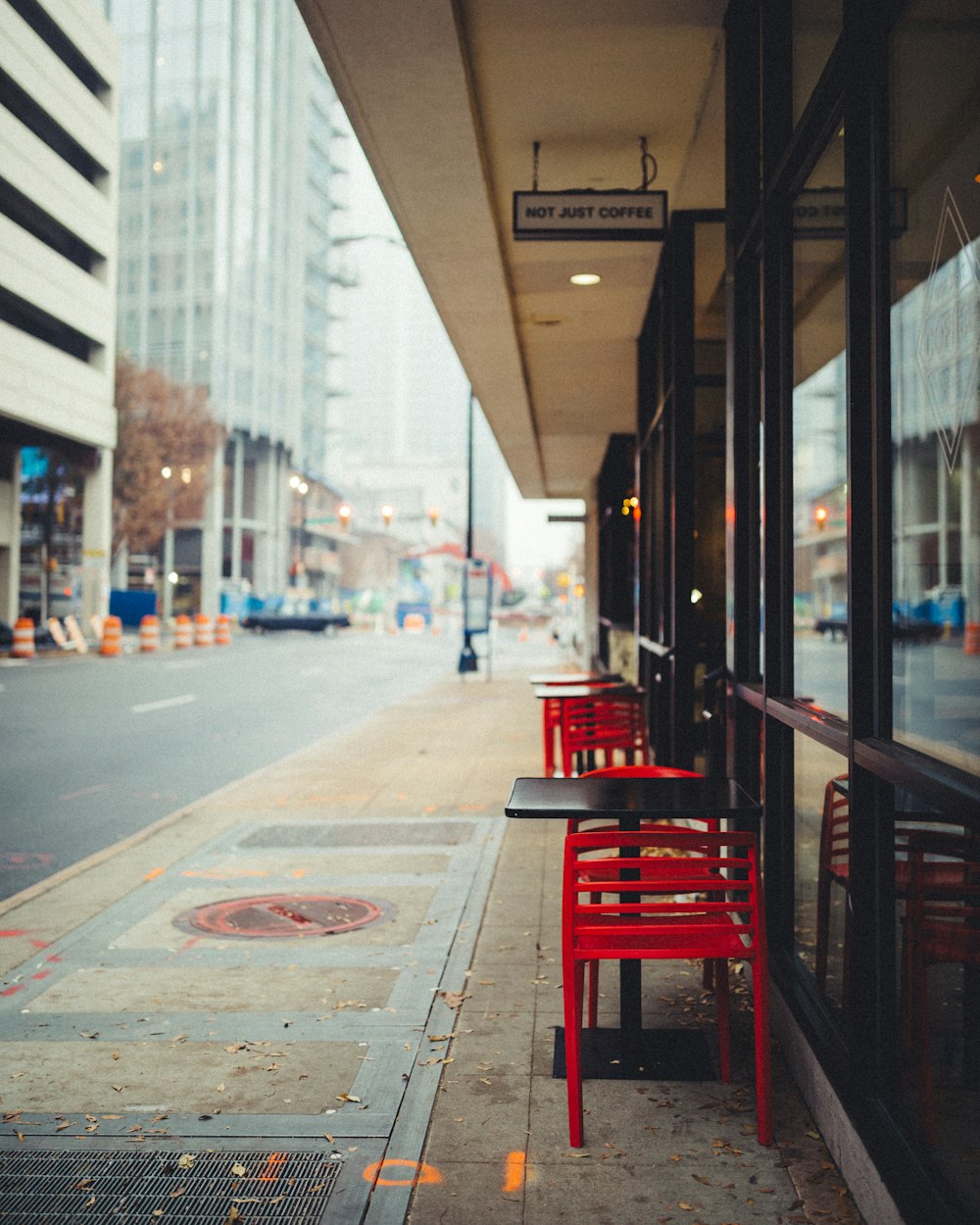 cafe tables and chairs on pathway