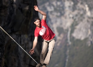 man waking on rope