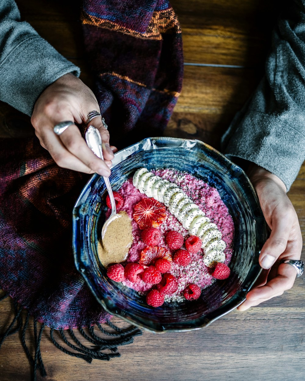 person eating soup