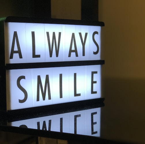 turned on Always Smile LED signage