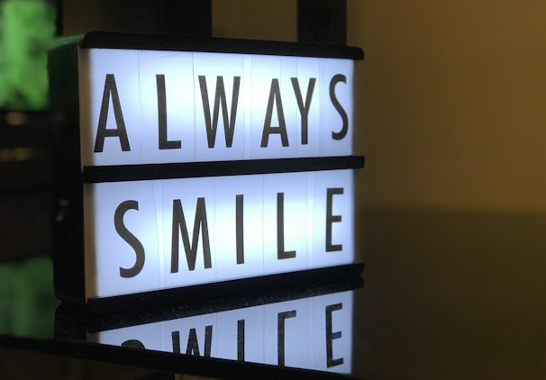 turned on Always Smile LED signage