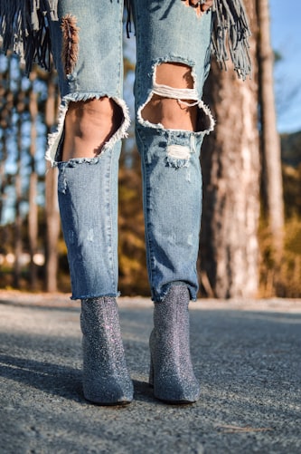 Women's Torn Jeans with Two Knees Showing